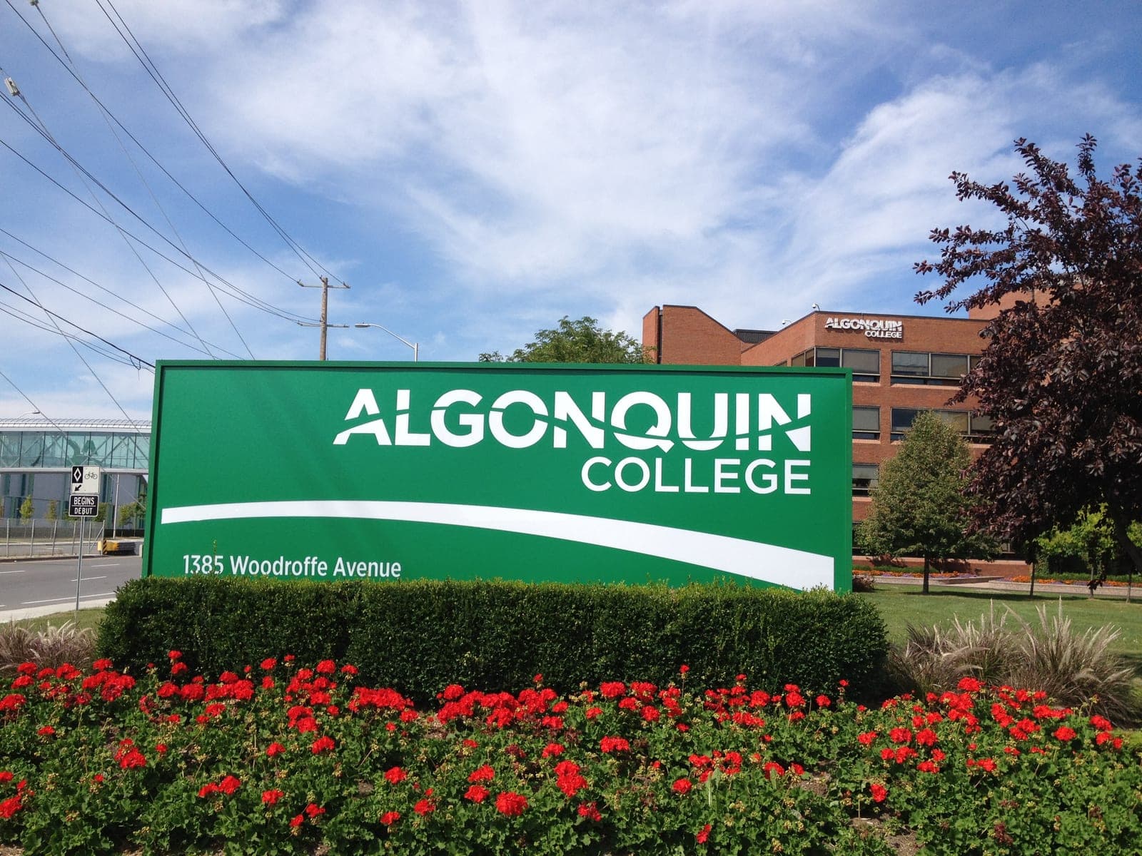 Algonquin College Woodroffe Campus entrance sign and building