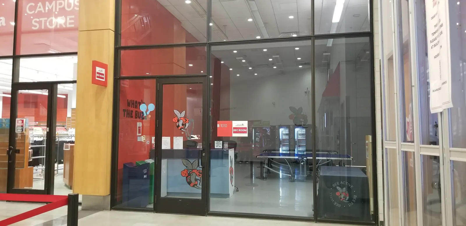 Glass doors into the Rec Room at Seneca Newnham Campus, with table tennis inside