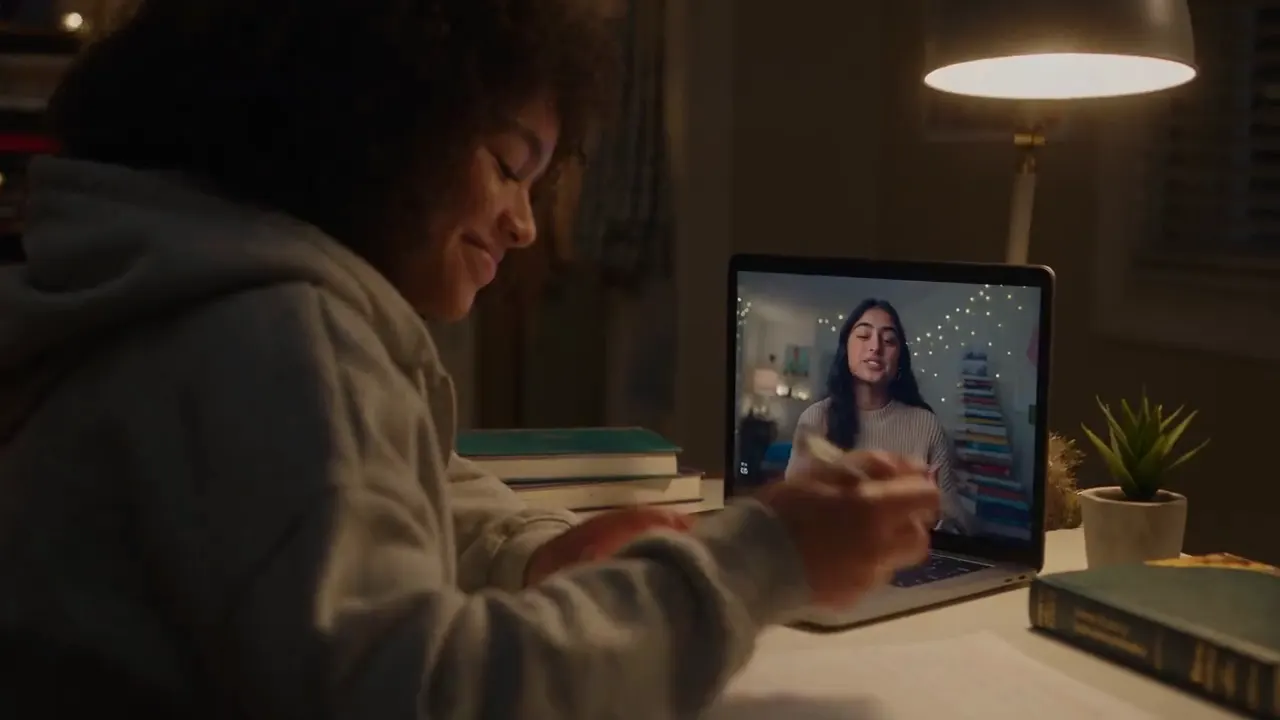 A high-school student meeting a current university student adviser online