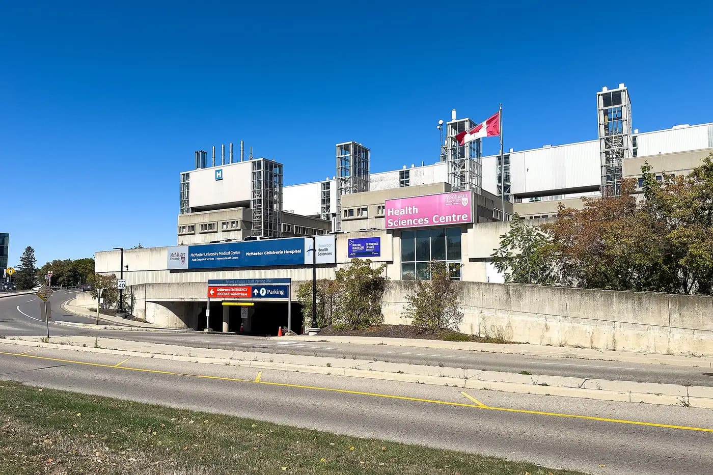 McMaster's Health Sciences Centre with hospital signage for McMaster University Medical Centre and McMaster Children's Hospital