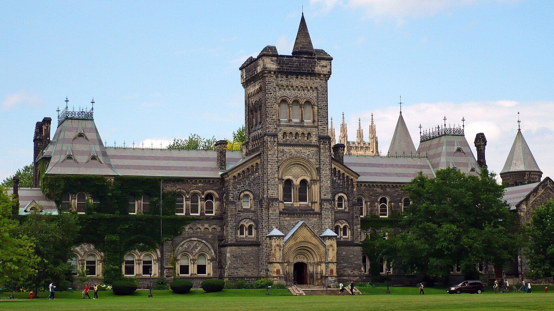 Stone facade and central tower of University College at U of T's St. George campus