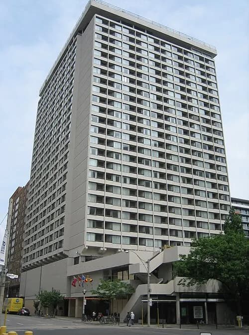 Exterior of the Chestnut Residence tower and its street-level entrance in Toronto
