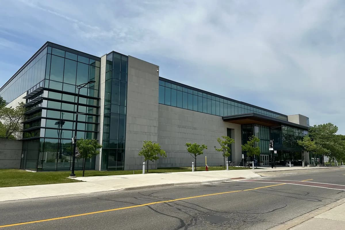 Glass and concrete exterior of the Recreation, Athletics and Wellness Centre at U of T Mississauga