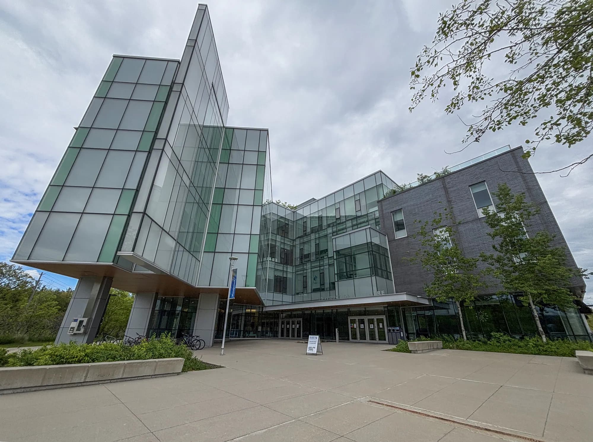 Glass-walled Instructional Centre at U of T Scarborough with a tall angled glass tower